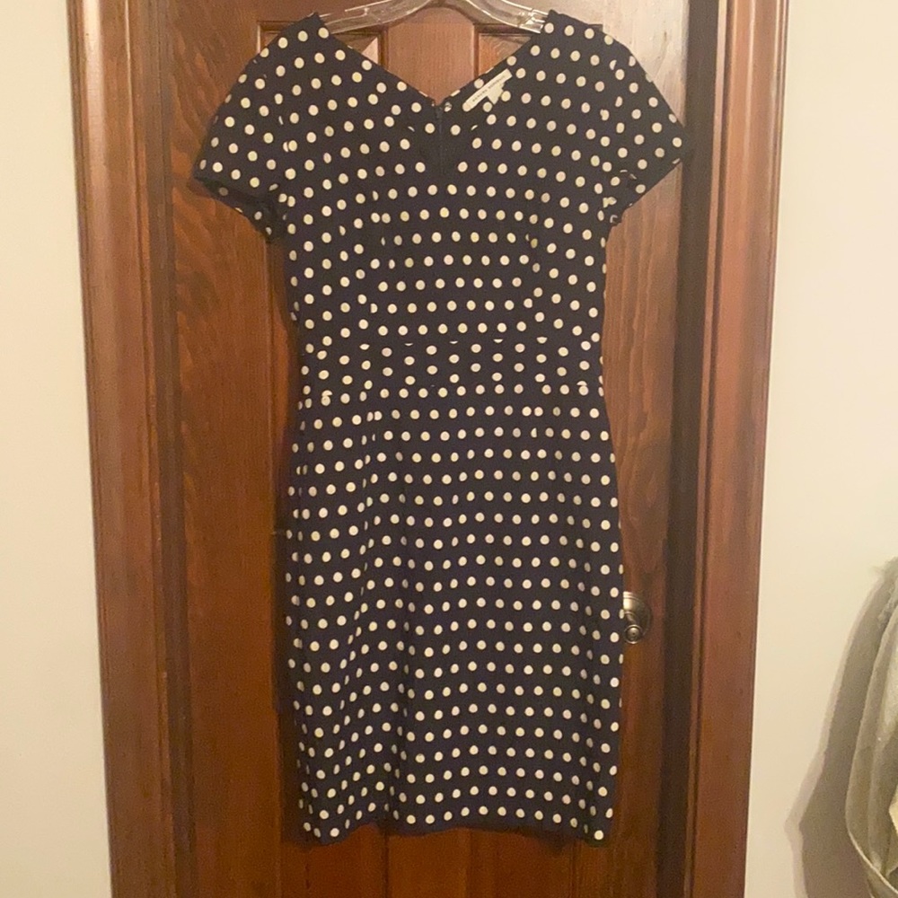 Navy and cream polka dot dress.